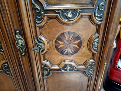 Richly molded and inlaid Louis XIV walnut cabinet – 18th century