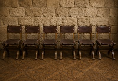 Set of six Renaissance-style chairs made of oak and leather