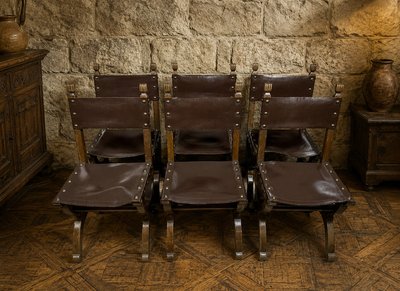 Set of six Renaissance-style chairs made of oak and leather