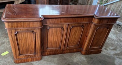 Large mahogany sideboard with attached cabinets—19th century