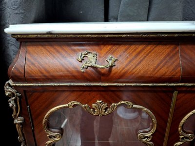 Napoleon III-era display cabinet with support legs, made of mahogany, gilded bronze, and white marble