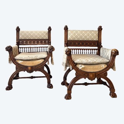 Pair of curule armchairs in walnut, late 19th century