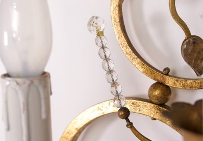 Impressive gold-plated wrought-iron wall sconces from the 1970s.