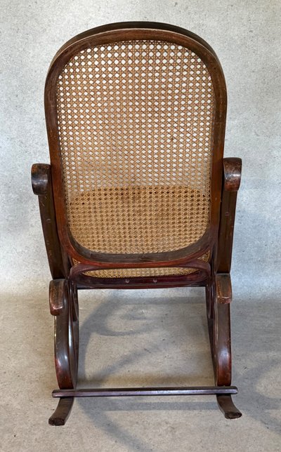 Rocking chair, minor damage to the caning