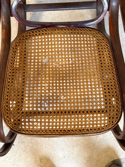 Rocking chair, minor damage to the caning