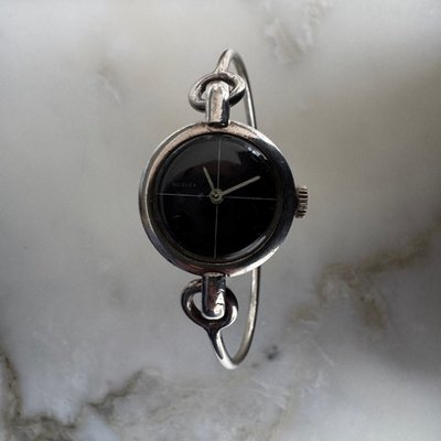 Montre Reglex en argent bracelet rigide