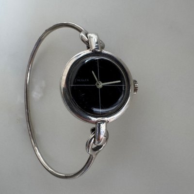 Montre Reglex en argent bracelet rigide