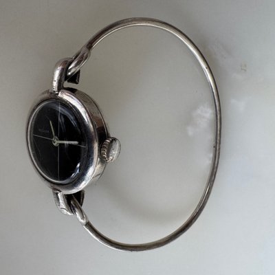 Montre Reglex en argent bracelet rigide
