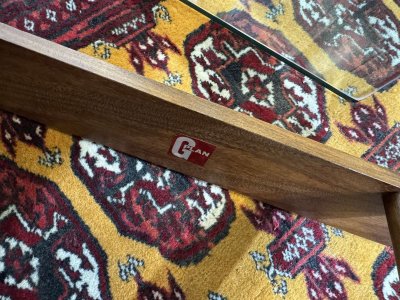 Octagonal GPlan side table from the 1970s in teak with a glass top
