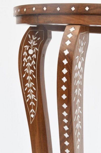 Pedestal table with bone or ivory inlays