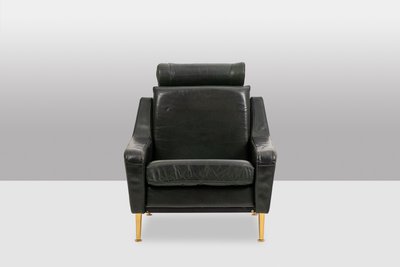 Airborne. Paar Sessel aus grünem Leder. 1950er Jahre.