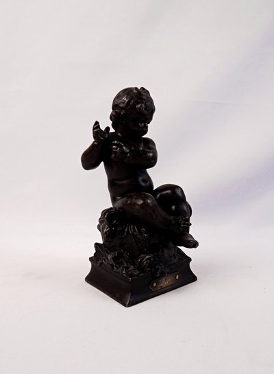 "The Child and the Lizard," a statuette in regul, with a brown patina, signed by Hyppolite Moreau, 19th century