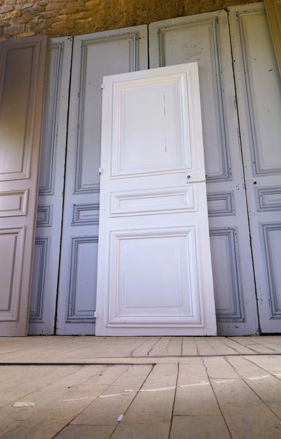 Historic Haussmann-style door with its original frame