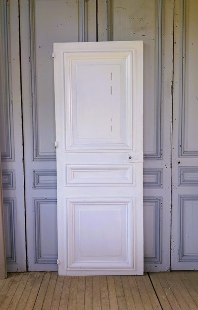 Historic Haussmann-style door with its original frame