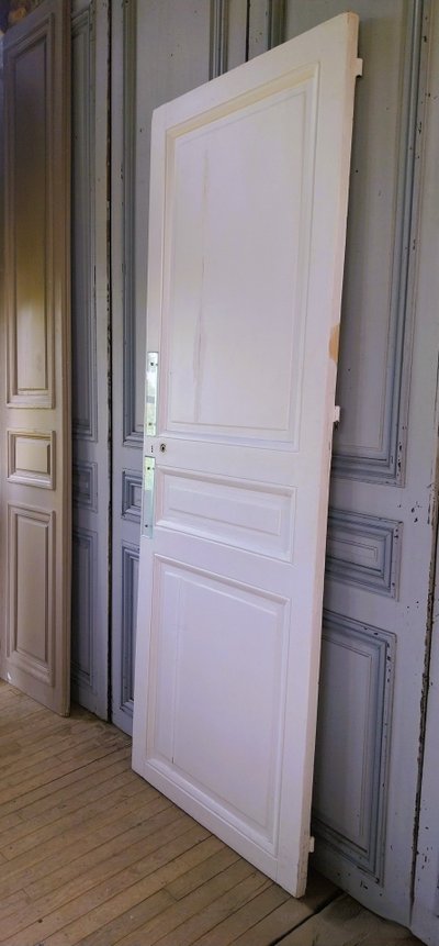 Historic Haussmann-style door with its original frame