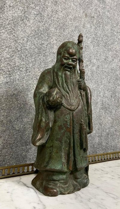 19TH CENTURY ASIA: BRONZE STATUE REPRESENTING A CHINESE SAGE, PROBABLY A TAOIST IMMORTAL