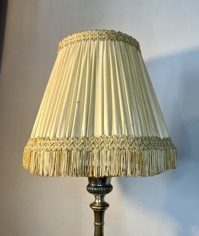 Candle holder mounted as a lamp