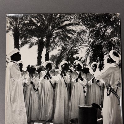 Foto in bianco e nero del 1960 che ritrae un gruppo di persone orientali