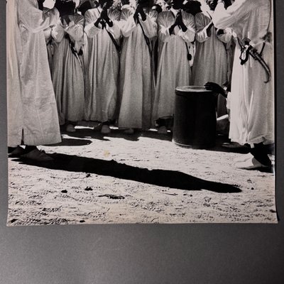Foto in bianco e nero del 1960 che ritrae un gruppo di persone orientali