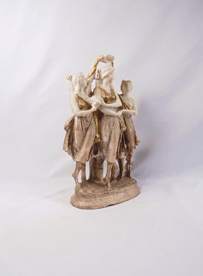 Sculpture titled "The Three Graces," made of white and gold resin, 20th century
