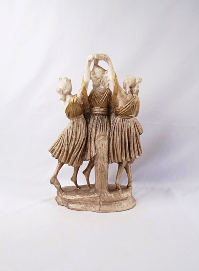 Sculpture titled "The Three Graces," made of white and gold resin, 20th century