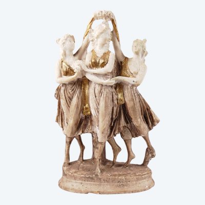 Sculpture titled "The Three Graces," made of white and gold resin, 20th century