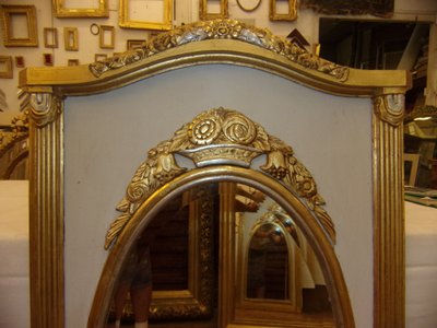 Specchio Art Déco in legno dorato e argentato, inizio XX secolo.