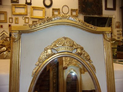 Specchio Art Déco in legno dorato e argentato, inizio XX secolo.