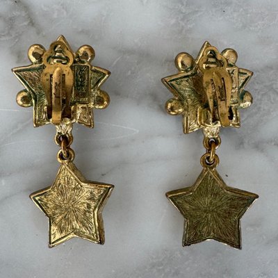 Coppia di orecchini Yves Saint Laurent a forma di stella