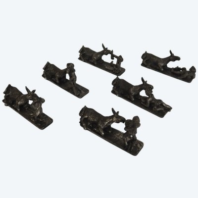 Suite de six portes couteaux Ane de Buridan