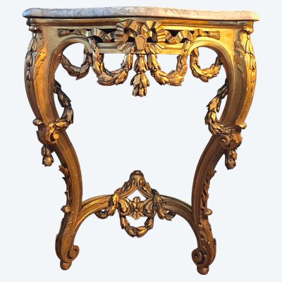 Carved and gilded wooden console in the Louis XV-Louis XVI Transition style, 19th century.
