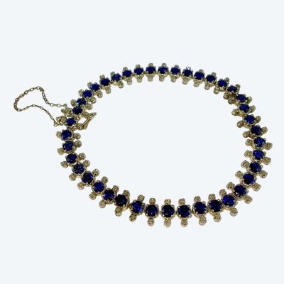 Bracciale con fila di zaffiri e diamanti su oro e argento