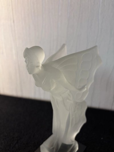 WOMAN: NIGHT BUTTERFLY