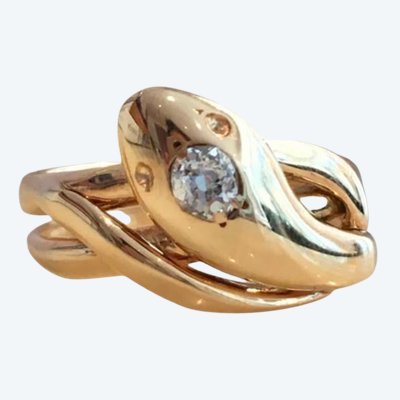 Vintage 18K yellow gold snake ring with a diamond