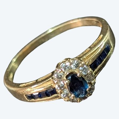18k gold Marguerite ring set with oval-cut diamonds and blue sapphires, size 57 FR / 8 US