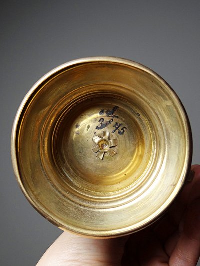 Antique pink opaline glass and gilt brass cup/candle holder, 19th century