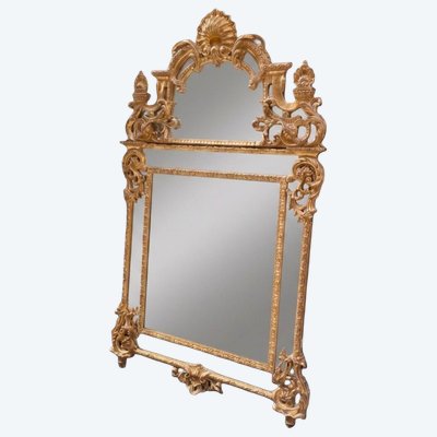 Important giltwood mirror in the Regency style, first half of the 19th century