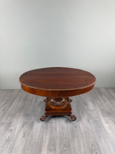 Table ovale de style Empire à pied central, XIXe siècle