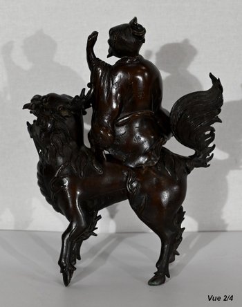 Personaggio cinese in bronzo e cane Fao, stile asiatico - inizio XX secolo