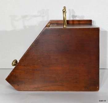 Small coal reserve in solid oak, England - 1900