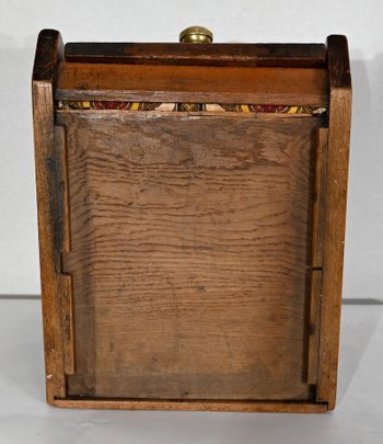 Small coal reserve in solid oak, England - 1900