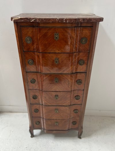 Transition style chest of drawers in rosewood and amaranth veneer, 20th century