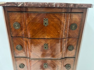 Transition style chest of drawers in rosewood and amaranth veneer, 20th century