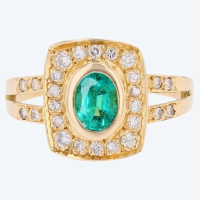 Yellow Gold Ring With An Emerald And Rectangular Diamonds