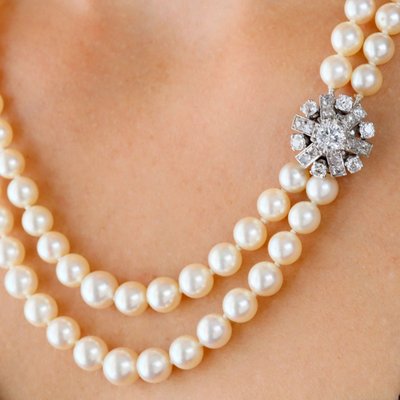 Collier double rang de perles et son fermoir diamants