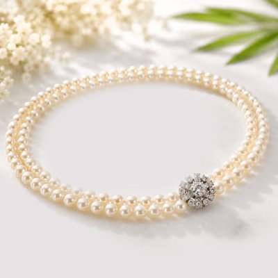 Collier double rang de perles et son fermoir diamants