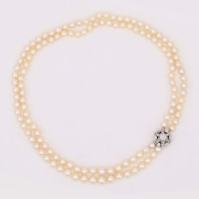 Collier double rang de perles et son fermoir diamants