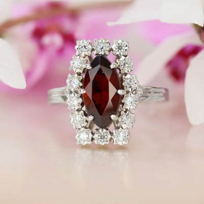 Vintage Ring With A Marquise-cut Garnet And Diamonds