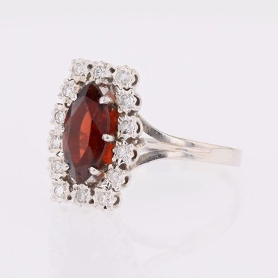 Vintage Ring With A Marquise-cut Garnet And Diamonds