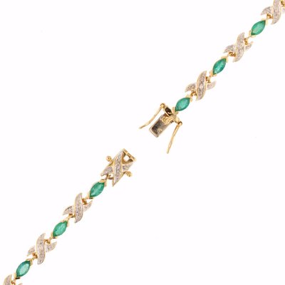 Bracelet ligne émeraudes diamants